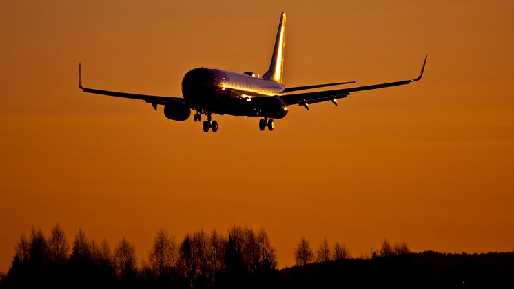 Norwegian aircraft at sunset