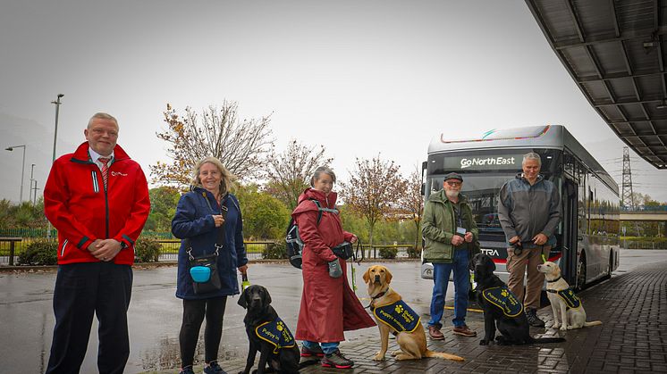 (Pictured from left to right: Go North East driver – Paul Frazer, Ashby with puppy raiser Audrey, Viva with puppy raiser Marie, Harvey with puppy raiser Paul and Esmay with puppy raiser Mark)