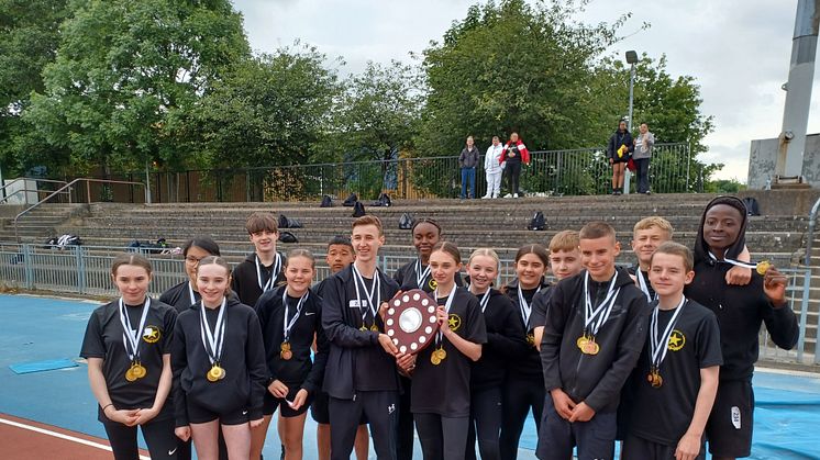 Students from Eastbank Academy celebrate their win at the 2024 ng Classics Athletic final. 