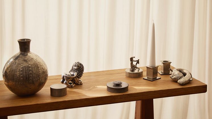Pewter pieces and library table by Axel Einar Hjorth from the Modern & Contemporary auction.
