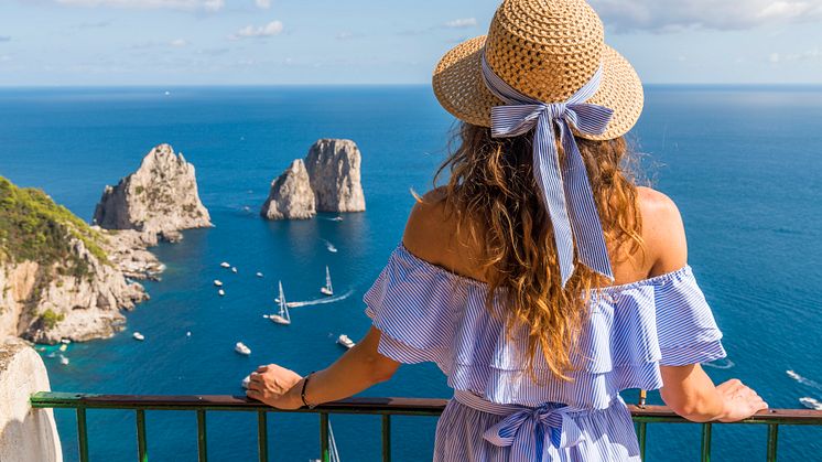 italy-naples-capri-sea-woman-918440300.jpg