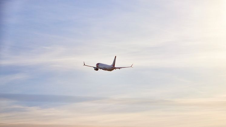 Norwegian MAX in colourful sky