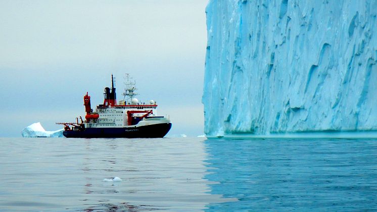 The RV Polarstern in front of a huge iceberg in Pine Island Bay (Credit: J Klages, AWI)