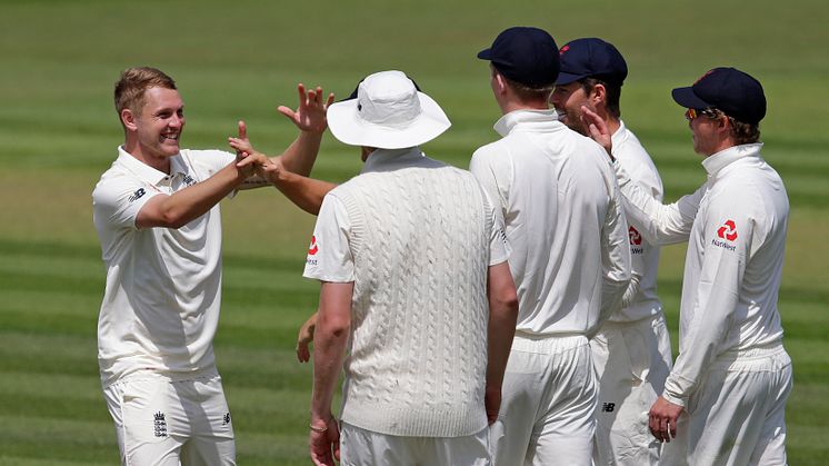 Jamie Porter celebrates a wicket for England Lions against the Australian XI in Canterbury