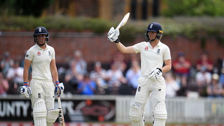 Amy Jones celebrates reaching 50 in the Test match against Australia