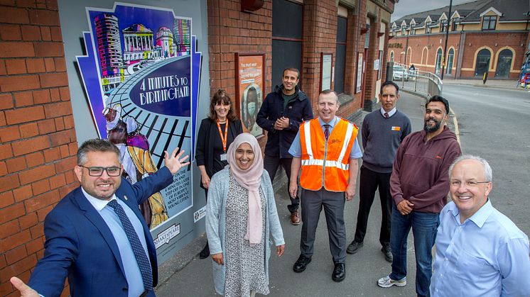 Representatives from West Midlands Railway, communities and local councillors unveil the artwork.