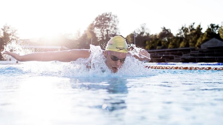 Swimming like a dolphin puts a smile on the face of young Swedish elite swimmer, Adam Paulsson (Photo: Magnus Peterson)