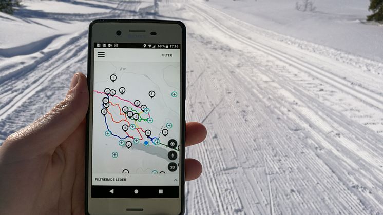 Lofsdalens app med skidspår i bakgrunden