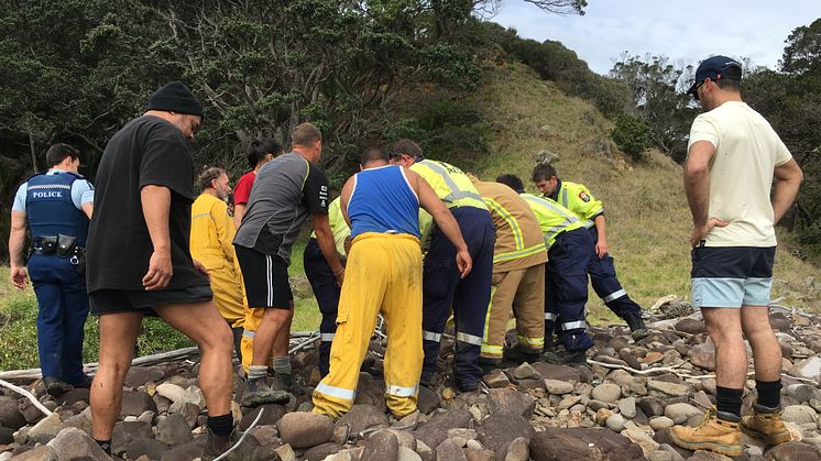 Rescue services attend to Dylan Holzheimer after an ACR Electronics ResQLink PLB was activated following his fall from a cliff while spear fishing