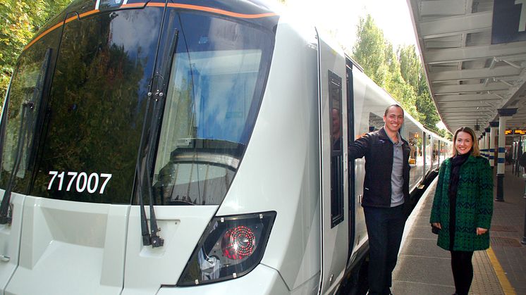 Driver Michael DeVries and passenger Samantha Radford at Gordon Hill on the first new Moorgate train in passenger service