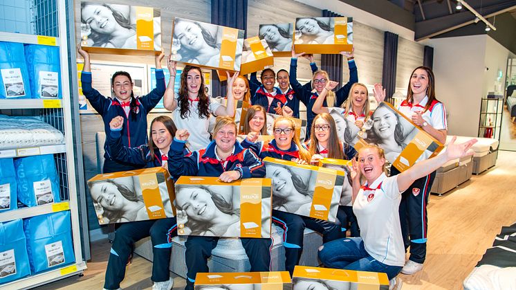 Saints Women's RFC celebrate raising £500 for St Helens homeless  in-store at JYSK