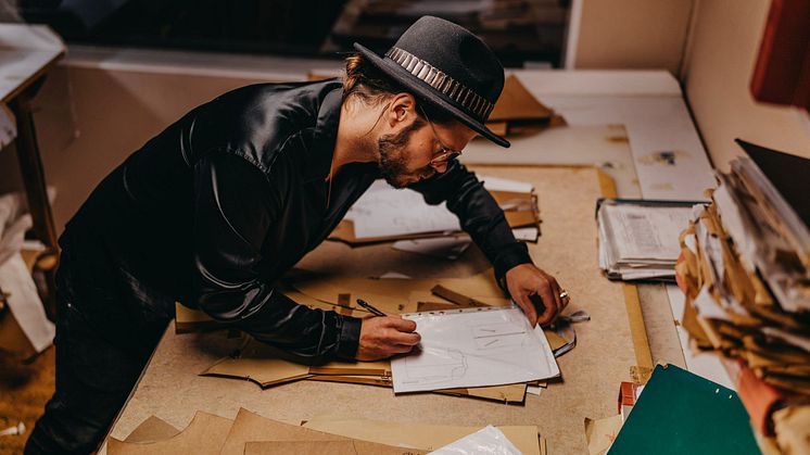 Martin Key in action designing leather jackets