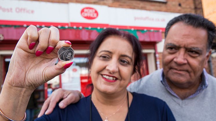 Postmaster Umesh Sanghani and his wife Rashmita outside Dedworth Green Post Office