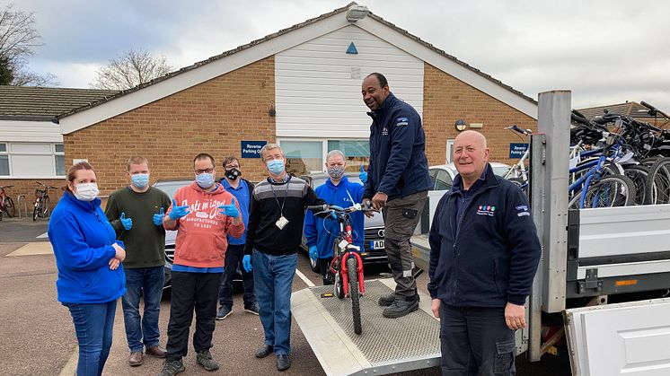 TAG Bikes trainee mechanics and their trainer take delivery of abandoned bikes from GTR’s Courtney Franklin and Paul Harknett