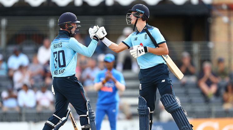 Jack Haynes (left) and Ben Charlesworth celebrate Charlesworth's 50