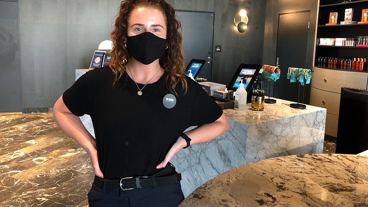 Photo: Staff member with face mask