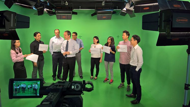 HBM's Mark Laudi and Communications Specialists on set at HBM's Kuala Lumpur studio