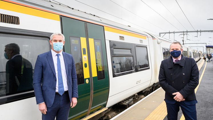 Stephen Barclay MP (left) with Govia Thameslink Railway's Infrastructure Director Keith Jipps and the preview 8-carriage train at Littleport