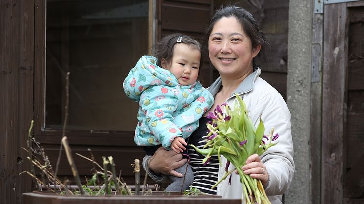 The Wong family in Whitefield using their brown bin