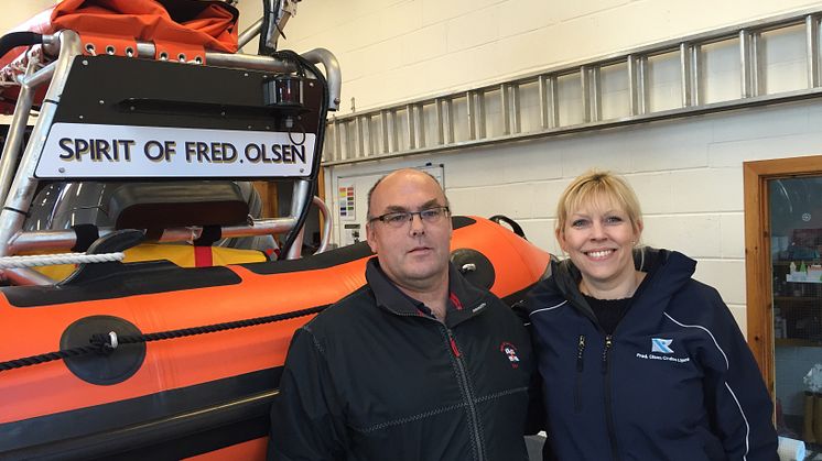 Fred. Olsen Cruise Lines' Rachael Jackson and Sandy Murray of Kyle of Lochalsh RNLI celebrate the two organisations' long-standing partnership, with Atlantic 85-class lifeboat 'Spirit of Fred. Olsen'   