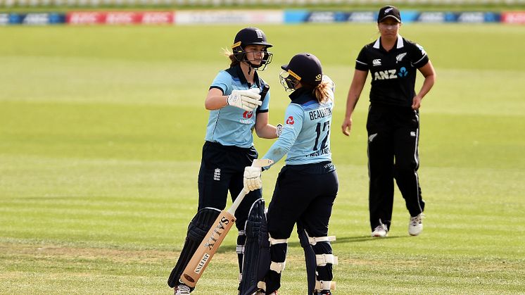 Amy Jones and Tammy Beaumont celebrate victory. Photo: Getty Images