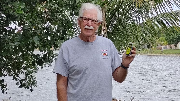 Frank Boyar with his ACR Electronics ResQLink Personal Locator Beacon