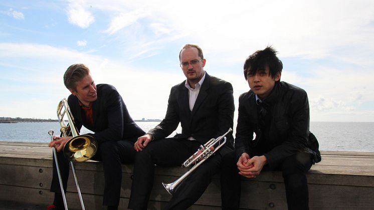 Trio Huang-Draglund-Rudolfsson