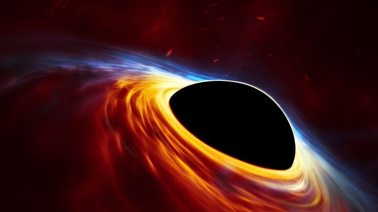 Supermassive black hole with torn-apart star (artist's impression) Credit: ESO, ESA/Hubble, M. Kornmesser