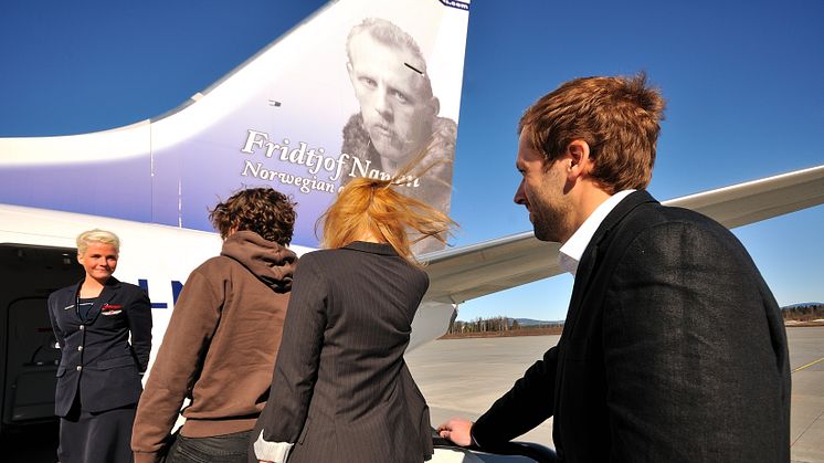 Passengers entering a Norwegian flight