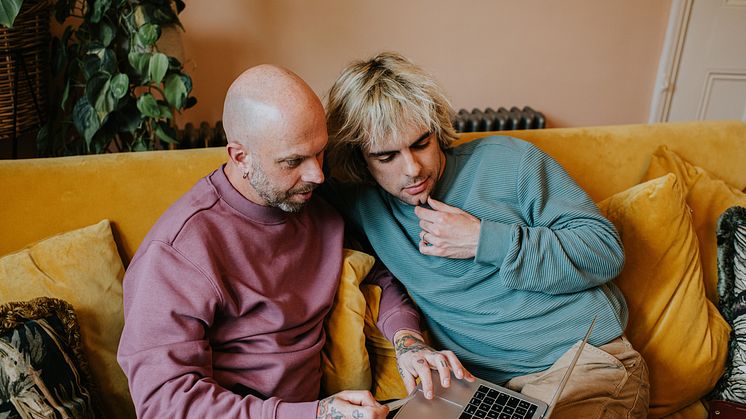 THEME_LGBTQ_GAY_COUPLE_LAPTOP_UK_GettyImages-1391657397_Universal_Within usage period_97929