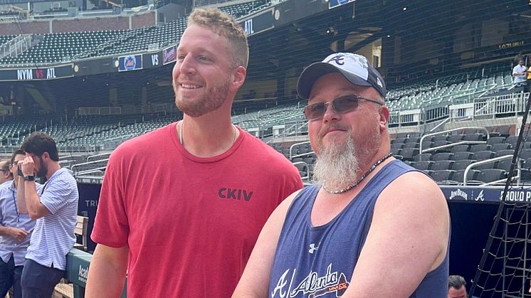 Braves pitcher Collin McHugh with Yanmar Strike Out the Side Inning Sweepstakes winner Kevin Fowler.