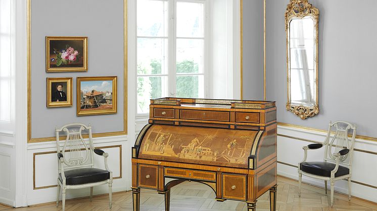 A German gilt bronze mounted marquetry cylinder bureau by David Roentgen (1743-1807).