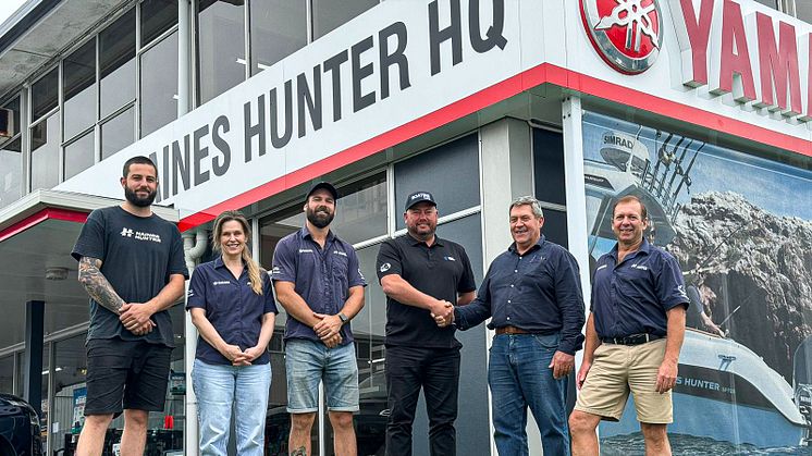 Haines Hunter CEO Denis Kendall (2nd from right) and Brock Terry (3rd from right) with the Haines Hunter HQ team