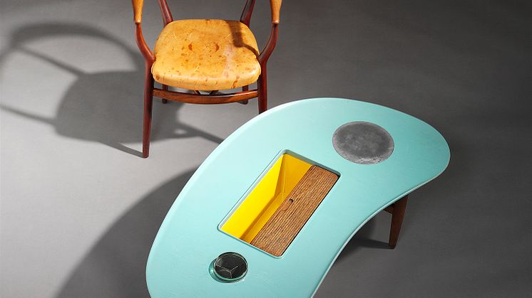 Finn Juhl FJ-44 armchair and a unique coffee table (1944-45).