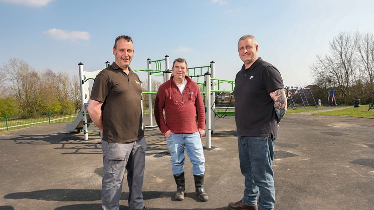 Cllr Alan Quinn (centre) at Dow Lane play area with grounds maintenance team members Dave Sweeney and Kevin Dickinson.