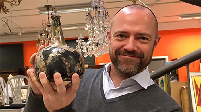 Wine specialist Henrik Christensen with the rare shipwreck wine