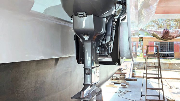 One of the YANMAR Neander Dtorque diesel outboards mounted mid-hull on sailing catamaran X-IT