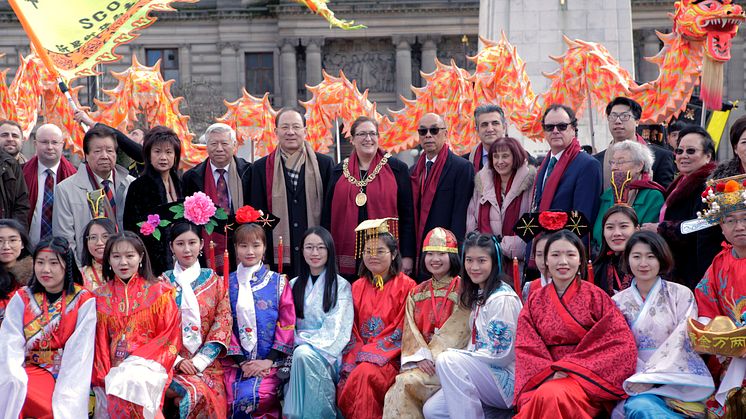 Lord Provost Eva Bolander (centre), Chinese Consul General Xinchun Pan (centre left), Chinese Cultural and Welfare Society Scotland Chairperson Andy Chung (centre right) and guests at George Square