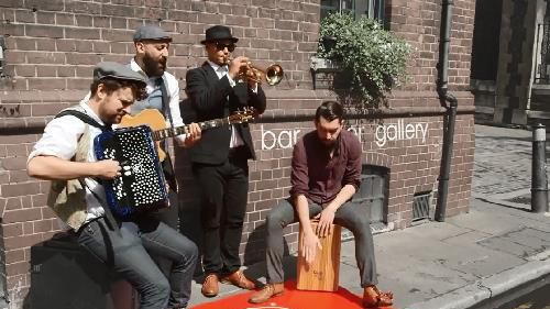 Street Performers in Edinburgh Celebrate Sundays with the Post Office