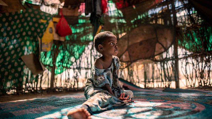 CH1697108_Three-year-old Maryan, who suffers from malnutrition, at her home in a drought-hit village in Garissa County, northern Kenya.