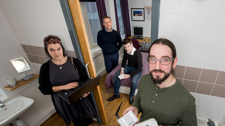 From l-r: Dr Kay Rogage (Northumbria University), Mark Riley (Your Homes Newcastle), Graham Coulby (BIM Academy) and Dr Adrian Clear (Northumbria University), pictured with the smart sensors used in the Smart Connected Buildings project.