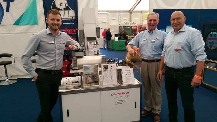 Fischer Panda UK’s Chris Fower, Sales and Marketing Director, and David Melville, Specialist Applications Sales Manager, with Martin Mews, Electric Propulsion Manager at Fischer Panda Germany, on the Fischer Panda Stand at Crick Boat Show