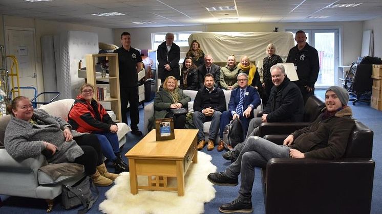 Steve Buckley from Manorview with ng homes volunteers and staff, Board member Richard porter, Rossie Stone from Dekko Comics and elected members Bailie Jaqueline McLaren, Councillor Allan Gow and Bob Doris MSP at the Redistribution Unit in Springburn