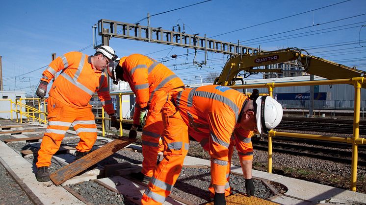 Engineers fitting new cables as part of the East Coast Digital Programme