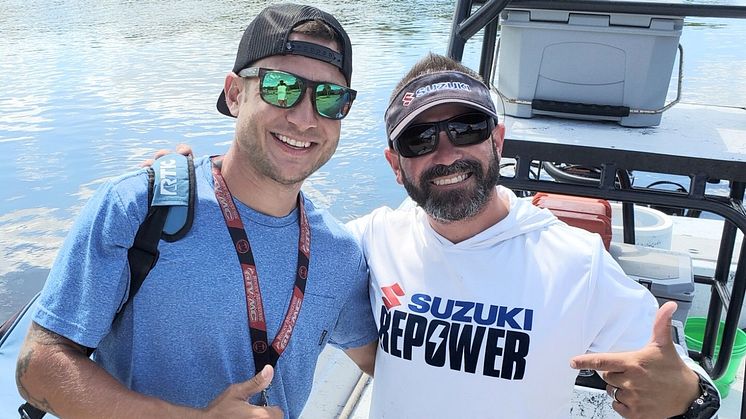 Mathew Cobb, grand prize winner of Mastry Engine Centers Owner's Edge Strike It Big Contest, with Captain Travis Yaeckel, of the Instinct Fishing Company