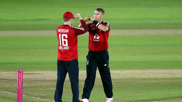 Tom Curran of England and Eoin Morgan of England embrace after victory in the 1st Vitality International Twenty20 match between England and Australia at The Ageas Bowl on September 04, 2020 in Southampton, England. (Photo by Andrew Matthews/Pool via 