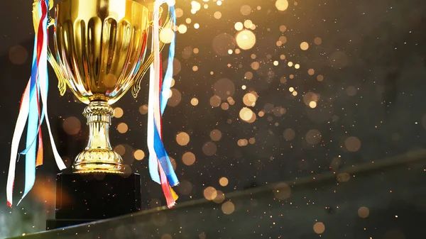 depositphotos_164940980-stock-photo-low-key-golden-trophy-blur