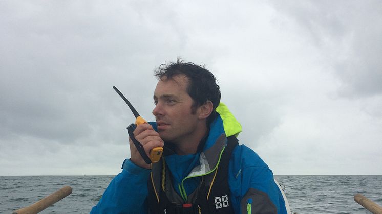 Hi-res image - Ocean Signal - Kyle Smith from Talisker Whisky Atlantic Challenge team Carbon Zerow with his Ocean Signal SafeSea V100 VHF handheld radio 