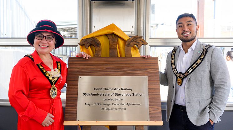 Mayor of Stevenage, Cllr Myla Arceno, unveils the  station's birthday plaque with Mayor's Consort John Arceno