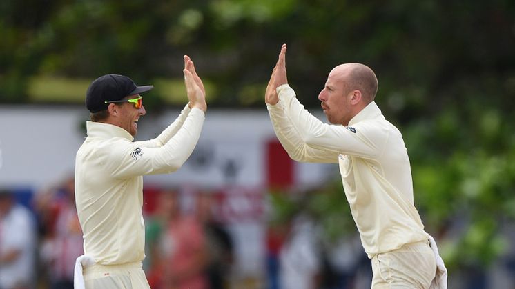 Jos Buttler (left) and Jack Leach playing for England (Getty Images)